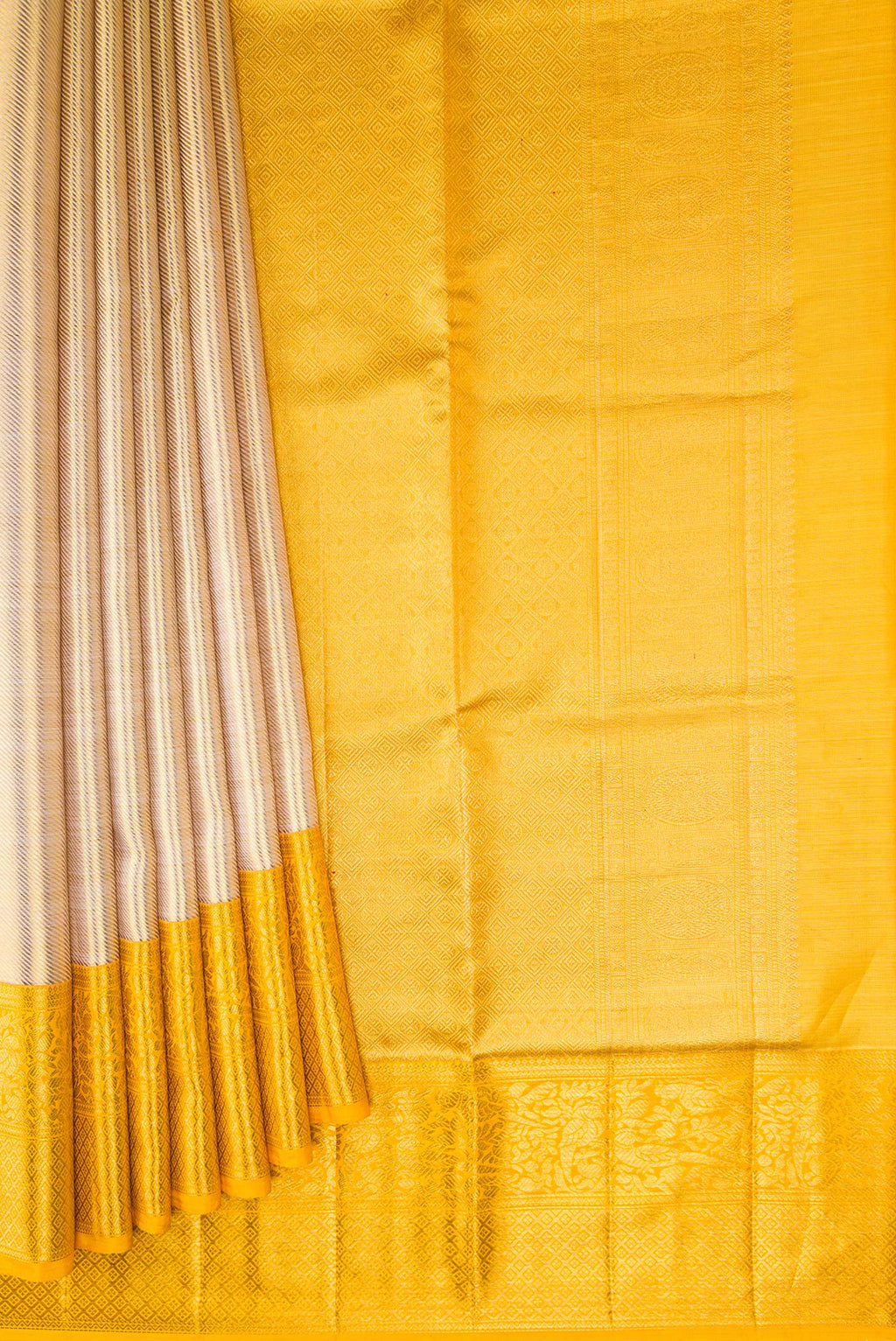 Pleats and pallu of Rose Gold Dual Tone Kanjivaram Tissue Silk Saree with Zari Brocade on the body and Zari Border. 