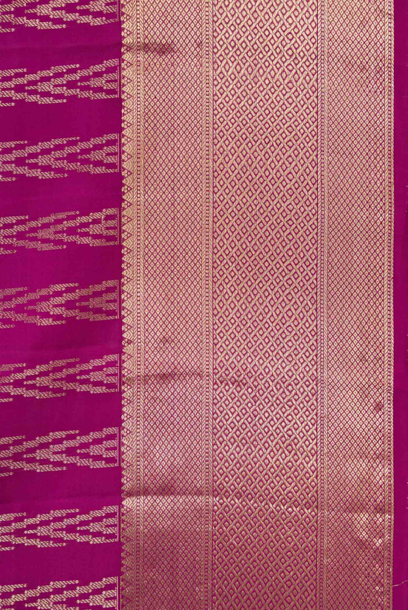 Border image of Magenta Dual Tone Kanjivaram Silk Saree with Zari Brocade on the body and Zari Border. 