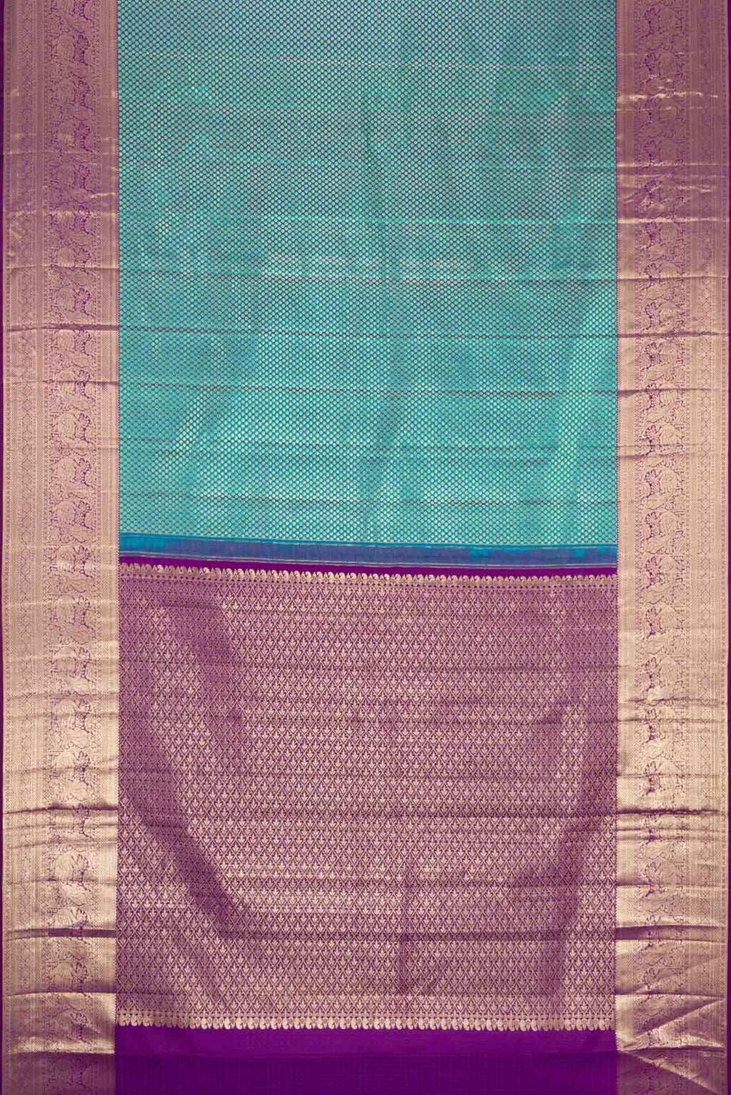 Flat view of Peacock Blue Dual Tone Kanjivaram Silk Saree with Zari Brocade on the body and Zari Border. 