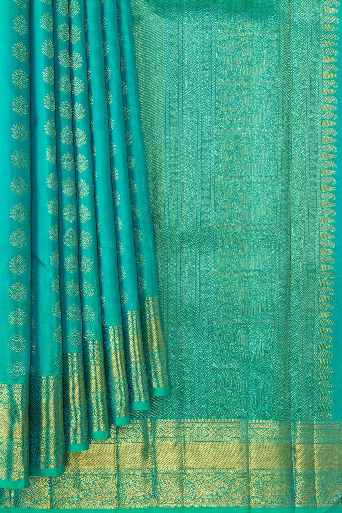 Pleats and pallu of Pure Silk Pure Zari Sea Green Dual Tone Kanjivaram Saree with Zari Butta on the body and Zari Border. 
