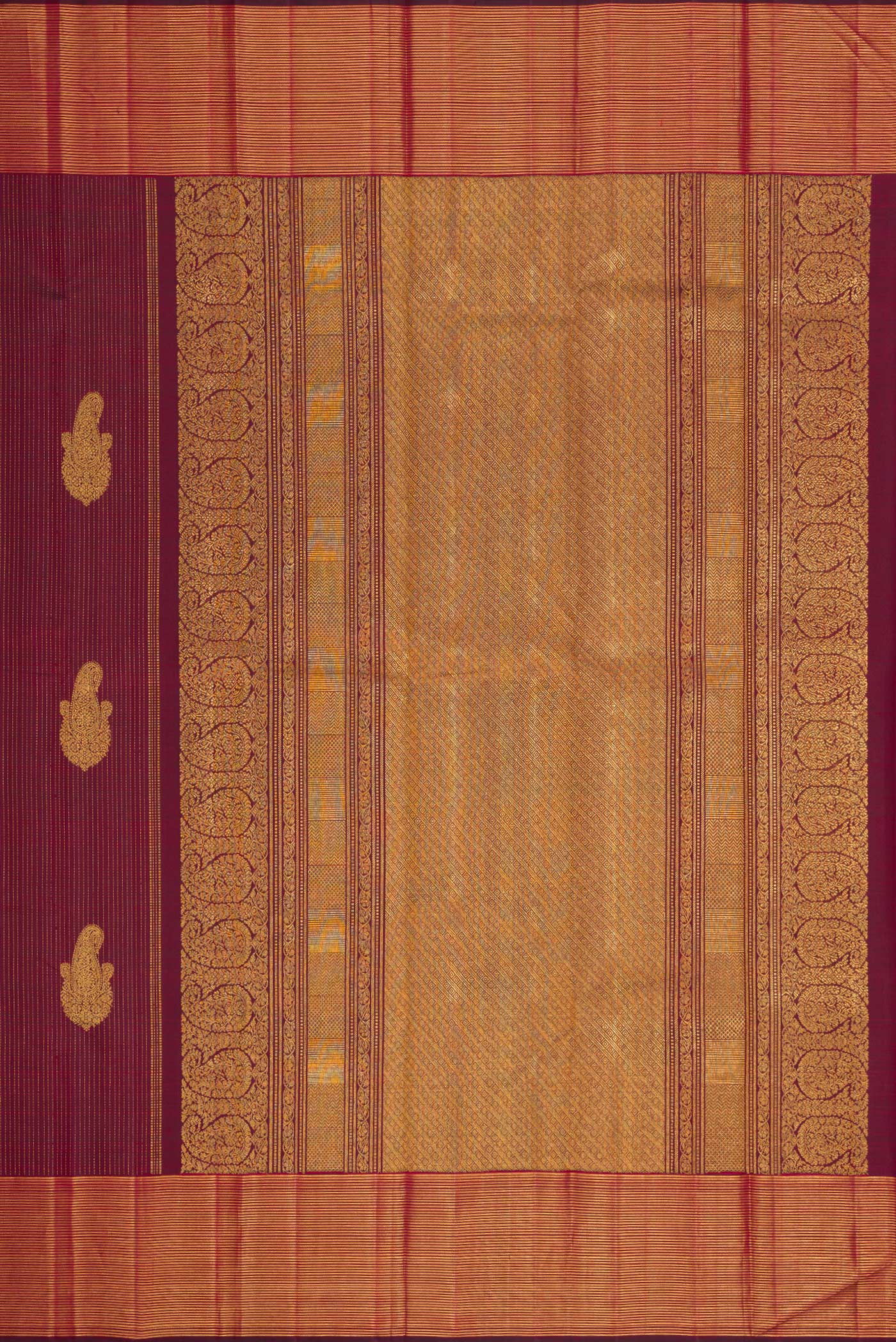 Close up image of the pallu of Pure Silk Pure Zari Maroon Dual Tone Kanjivaram Saree with Stripes on the body and Zari Border. 