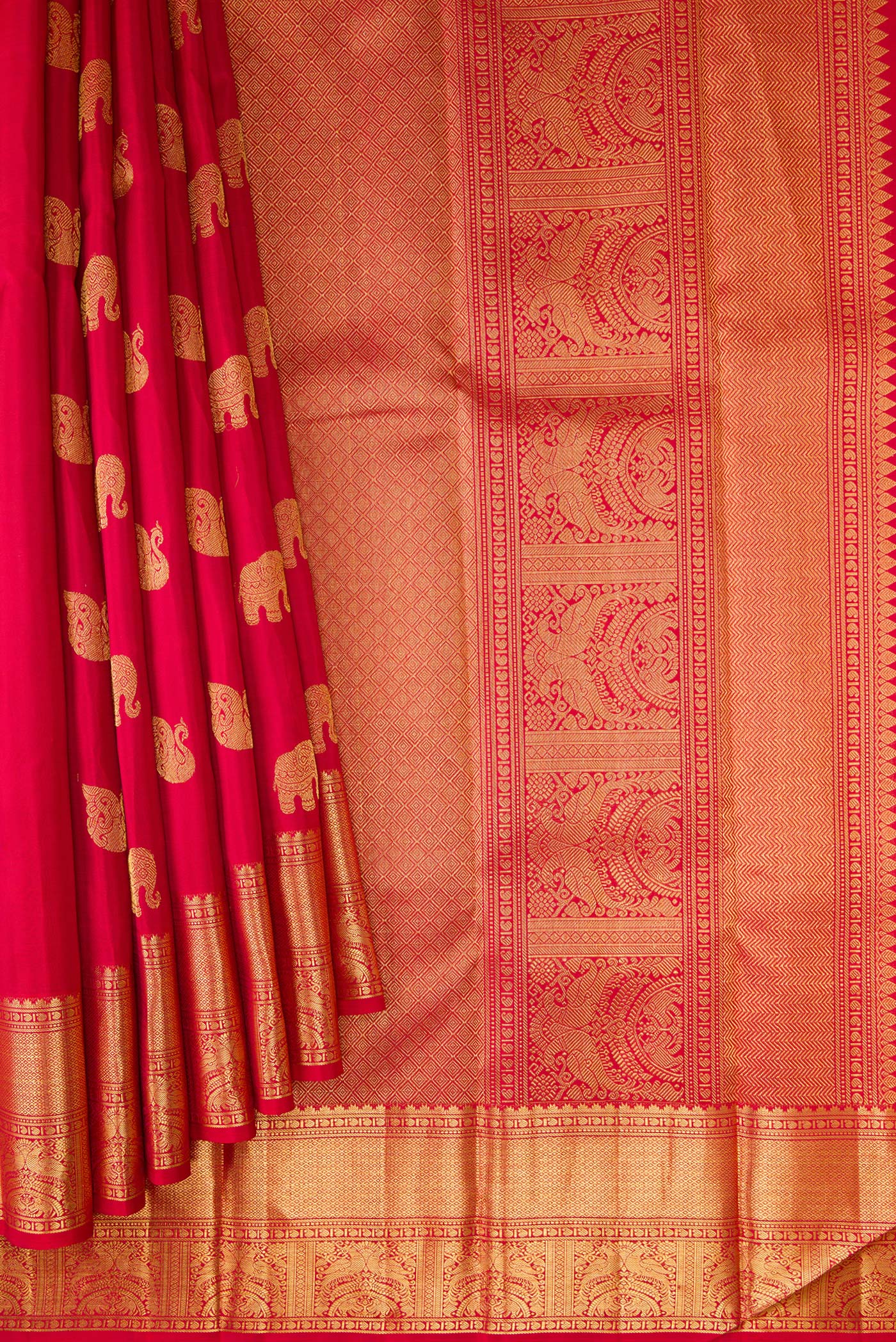 Pleats and pallu of Pure Silk Pure Zari Red Dual Tone Kanjivaram Saree with Zari Butta on the body and Zari Border. 