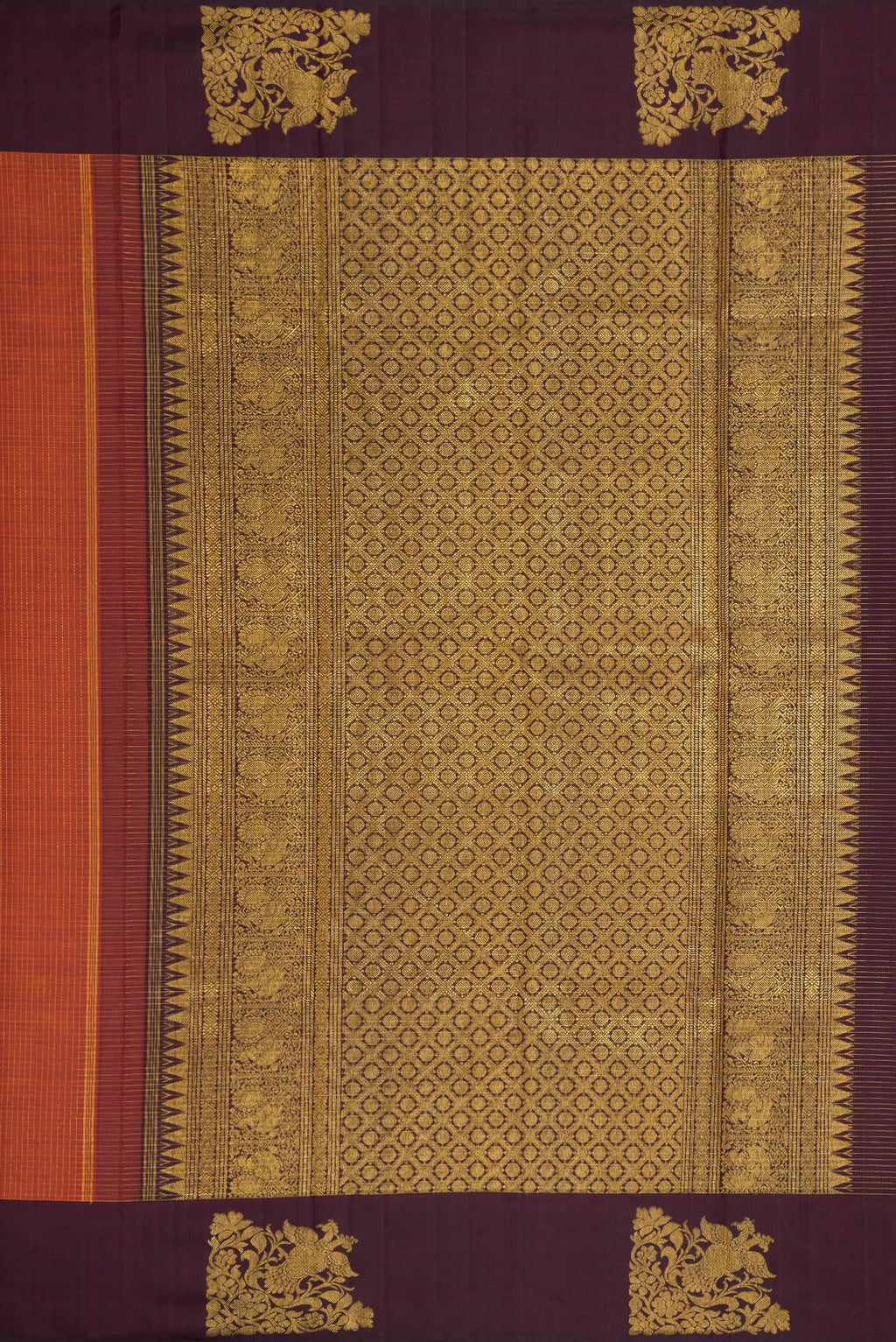 Close up image of the pallu of Brick Orange Dual Tone Kanjivaram Silk Saree with Checked design on the body and Fancy Border. 