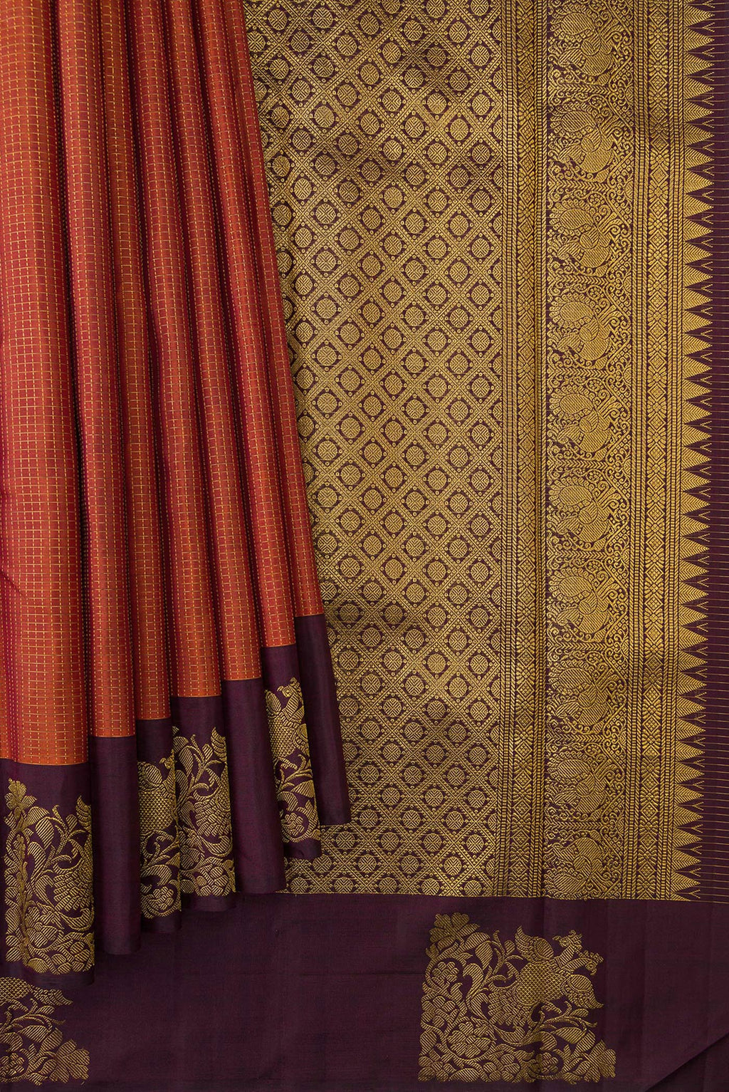 Pleats and pallu of Brick Orange Dual Tone Kanjivaram Silk Saree with Checked design on the body and Fancy Border. 