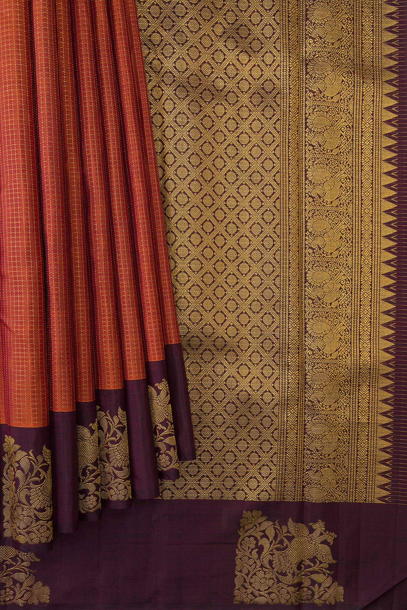 Pleats and pallu of Brick Orange Dual Tone Kanjivaram Silk Saree with Checked design on the body and Fancy Border. 