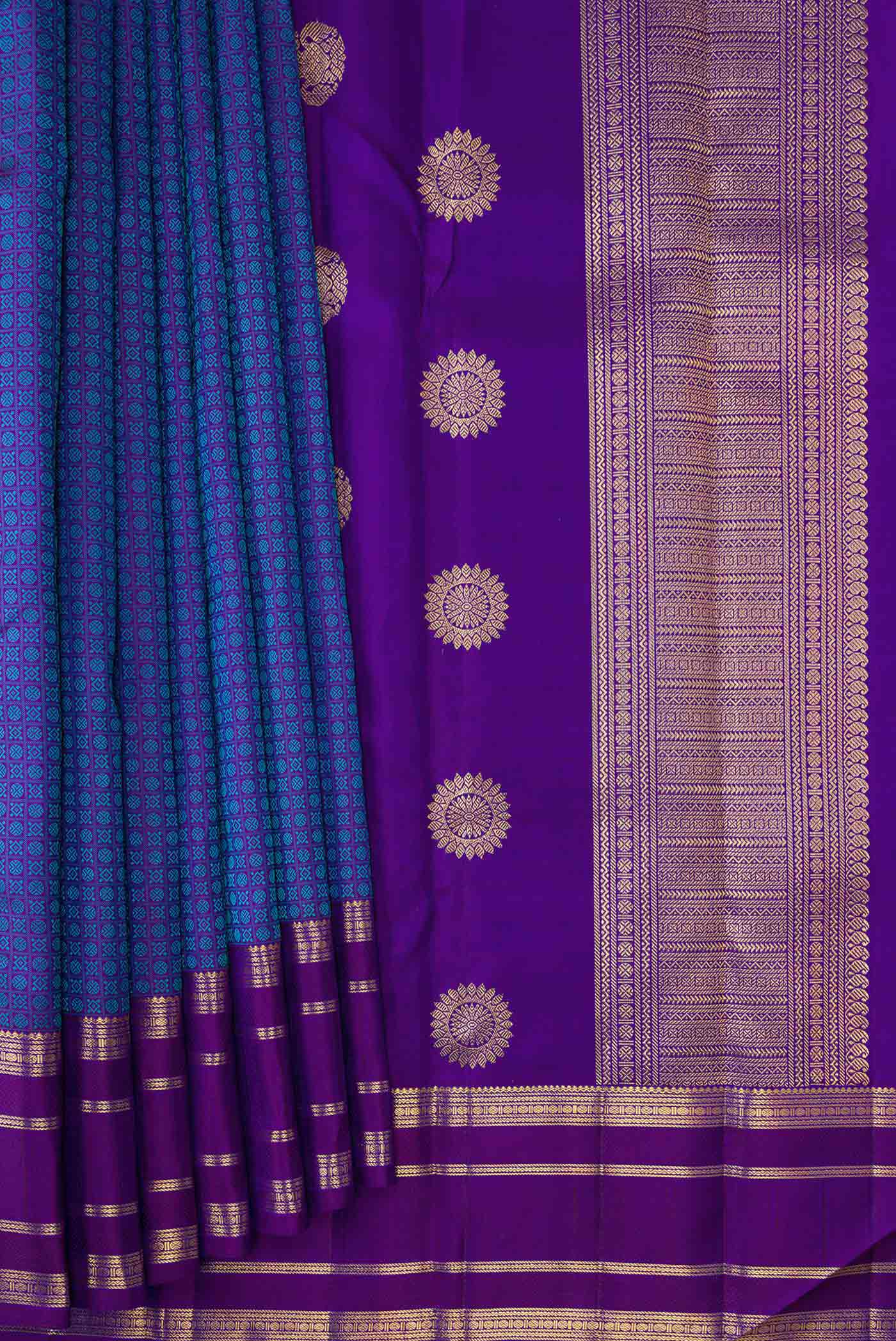 Pleats and pallu of Pure Silk Pure Zari Royal Blue Dual Tone Kanjivaram Saree with Jacquard With Zari Butta on the body and Zari Border. 