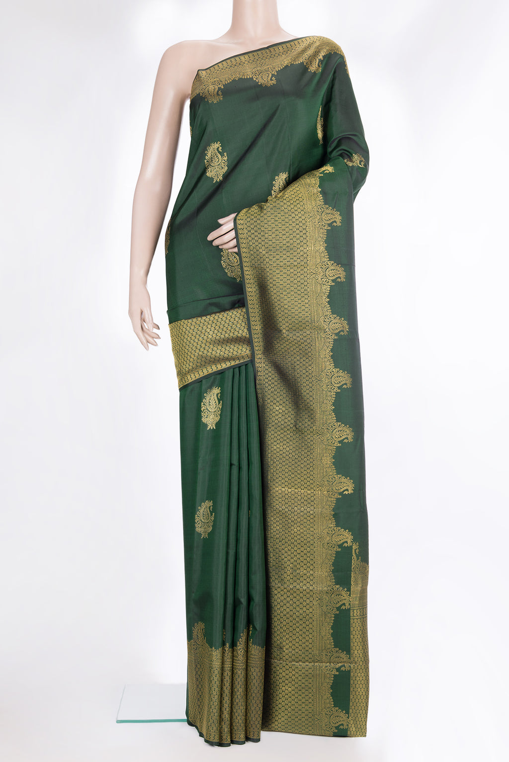 Pure Silk Bottle Green Dual Tone Kanjivaram Saree with Zari Butta on the body and Fancy Border.  displayed on a mannequin