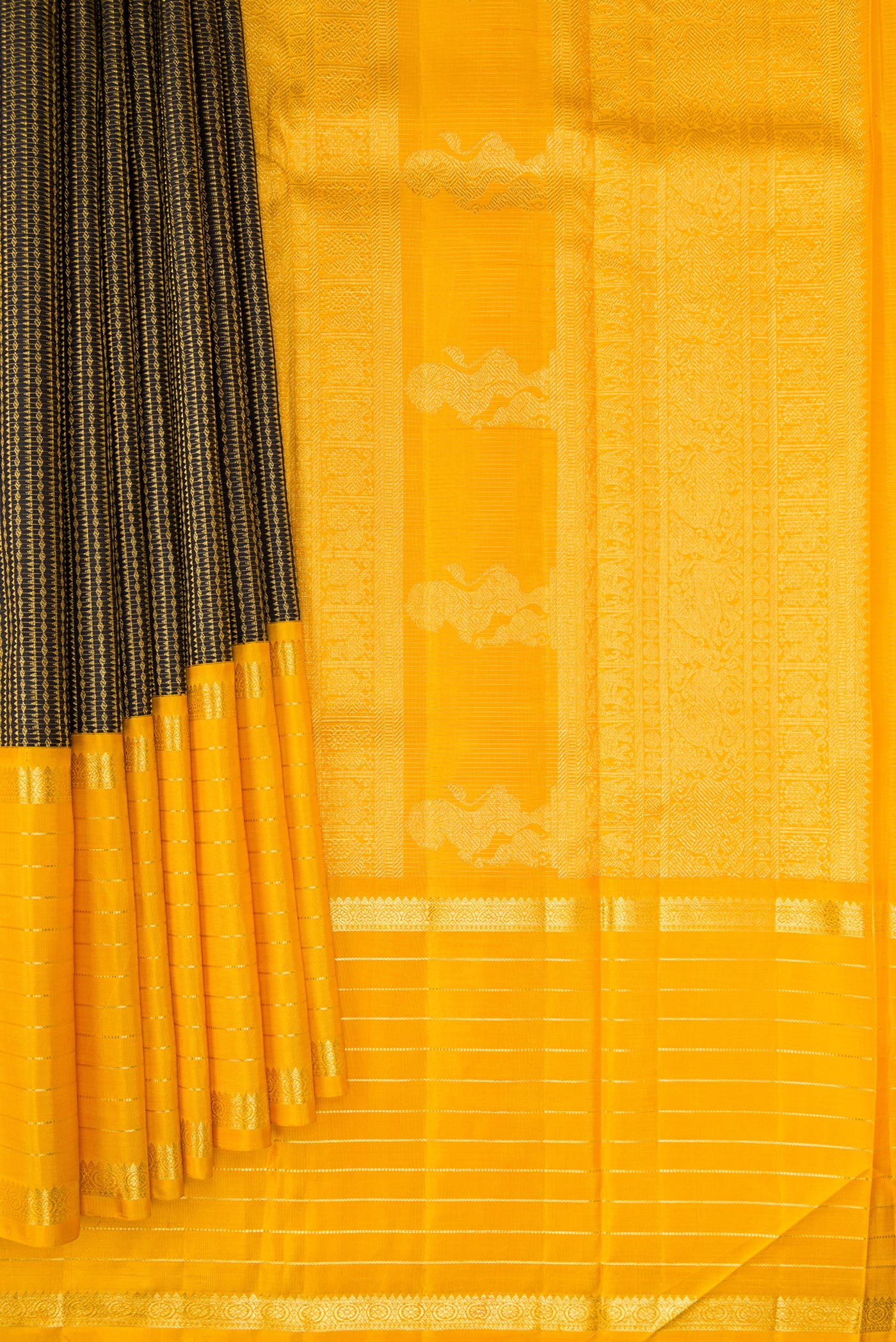 Pleats and pallu of Black Kanchipuram Silk Saree with Zari Brocade on the body and Zari Border. 