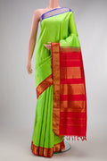 Pure Silk Pure Zari Parrot Green Kanchipuram Nine Yards Saree with Plain Body and Ganga Jamuna Border.  displayed on a mannequin