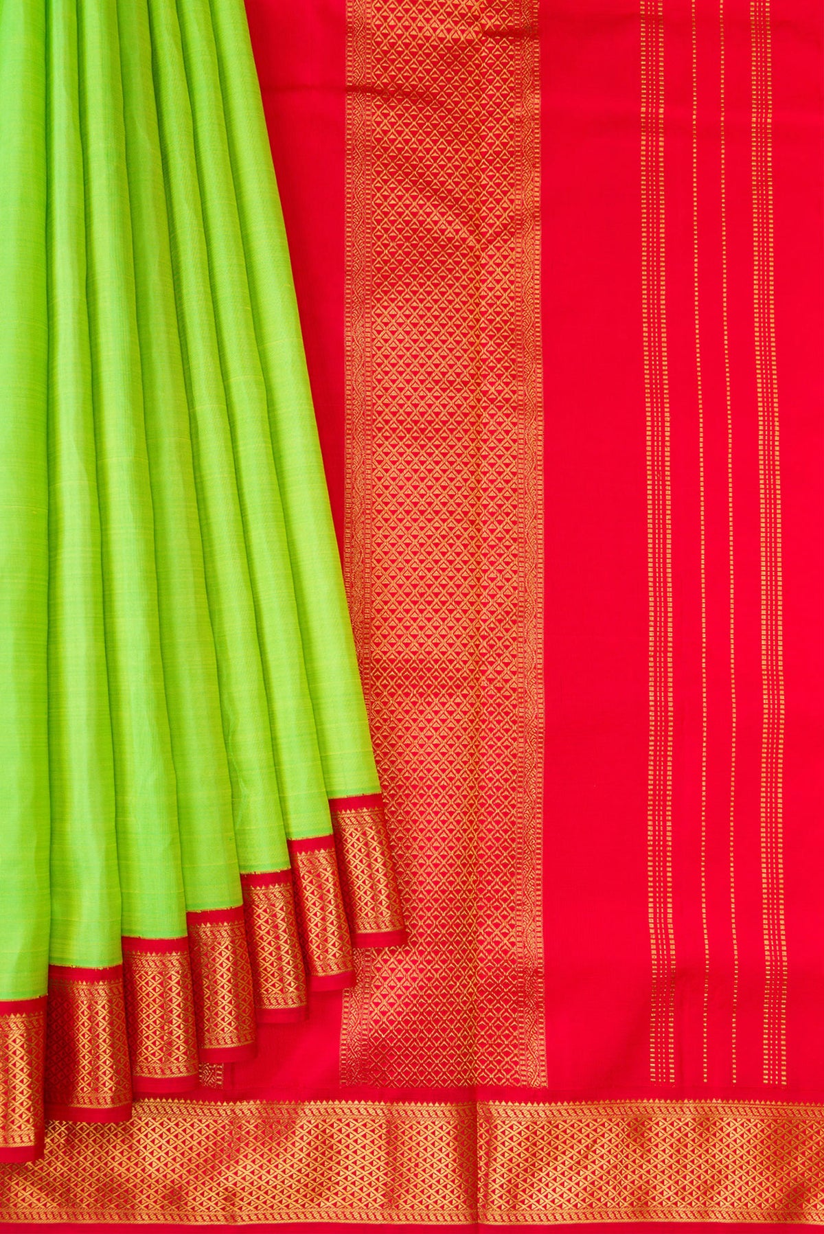 Pleats and pallu of Pure Silk Pure Zari Parrot Green Kanchipuram Nine Yards Saree with Plain Body and Ganga Jamuna Border. 