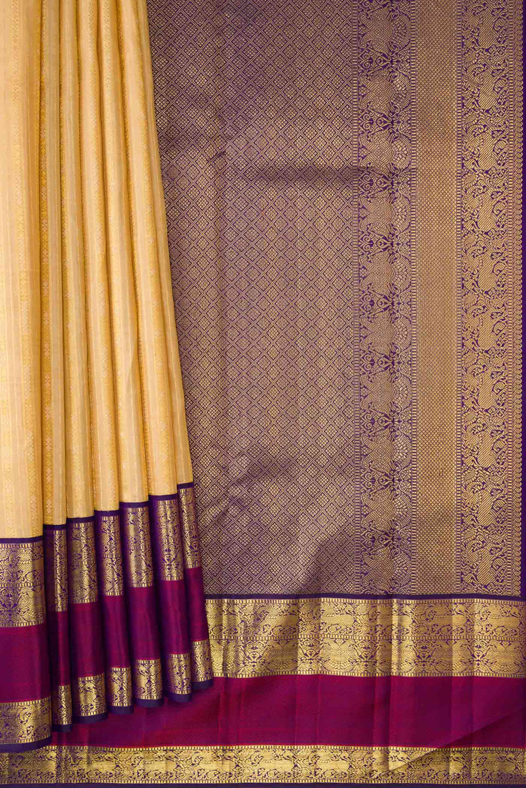 Pleats and pallu of Sandal Dual Tone Kanchipuram Silk Saree with Zari Brocade on the body and Zari And Thread Border. 