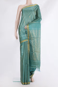 Pure Silk Green Dual Tone Tussar Saree with Zari Butta on the body and Zari Border.  displayed on a mannequin