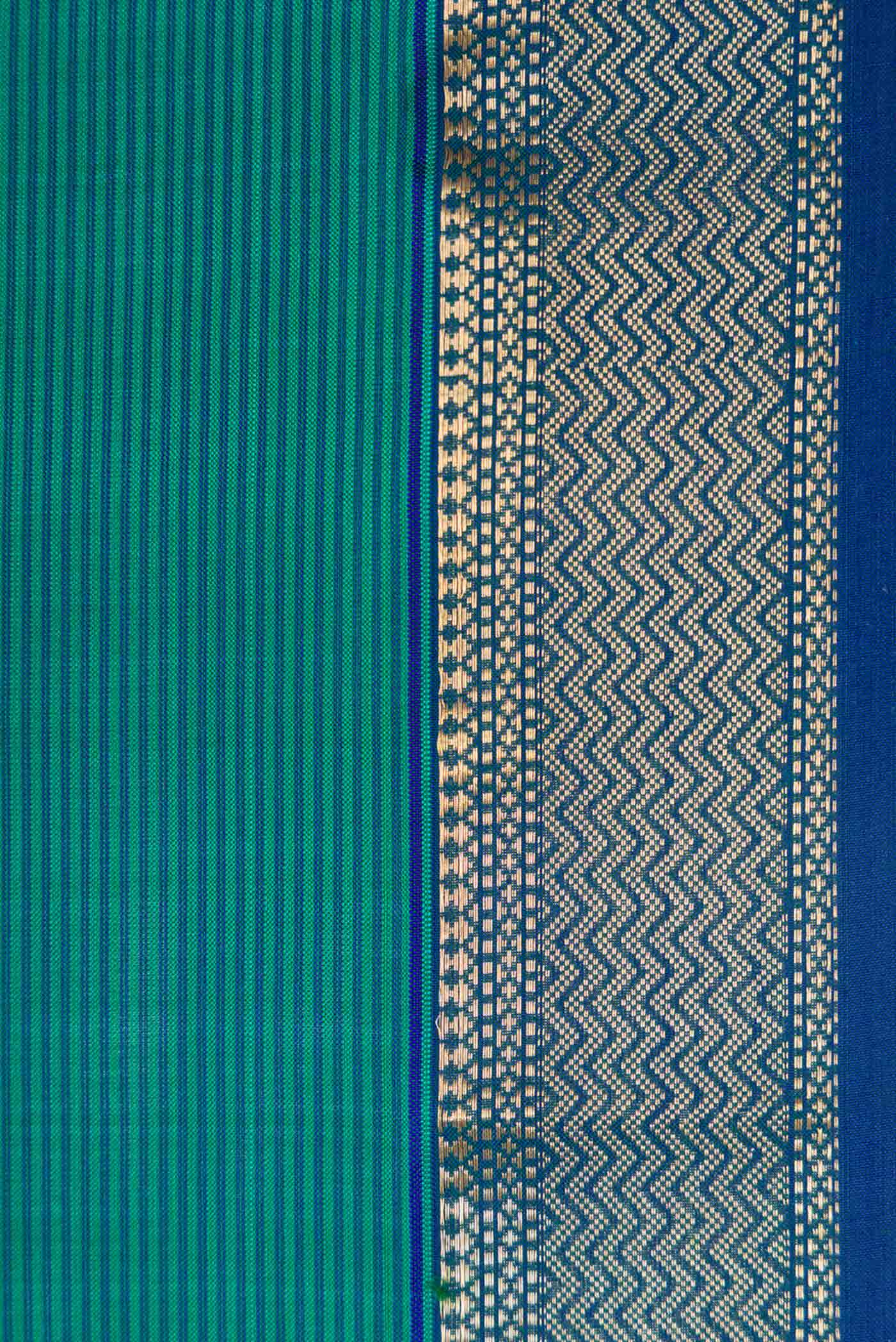 Border image of Peacock Blue Dual Tone Maheshwari Silk Saree with Stripes on the body and Zari Border. 