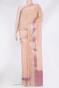 Peach Tussar Silk Saree with Zari Butta on the body and Fancy Border.  displayed on a mannequin