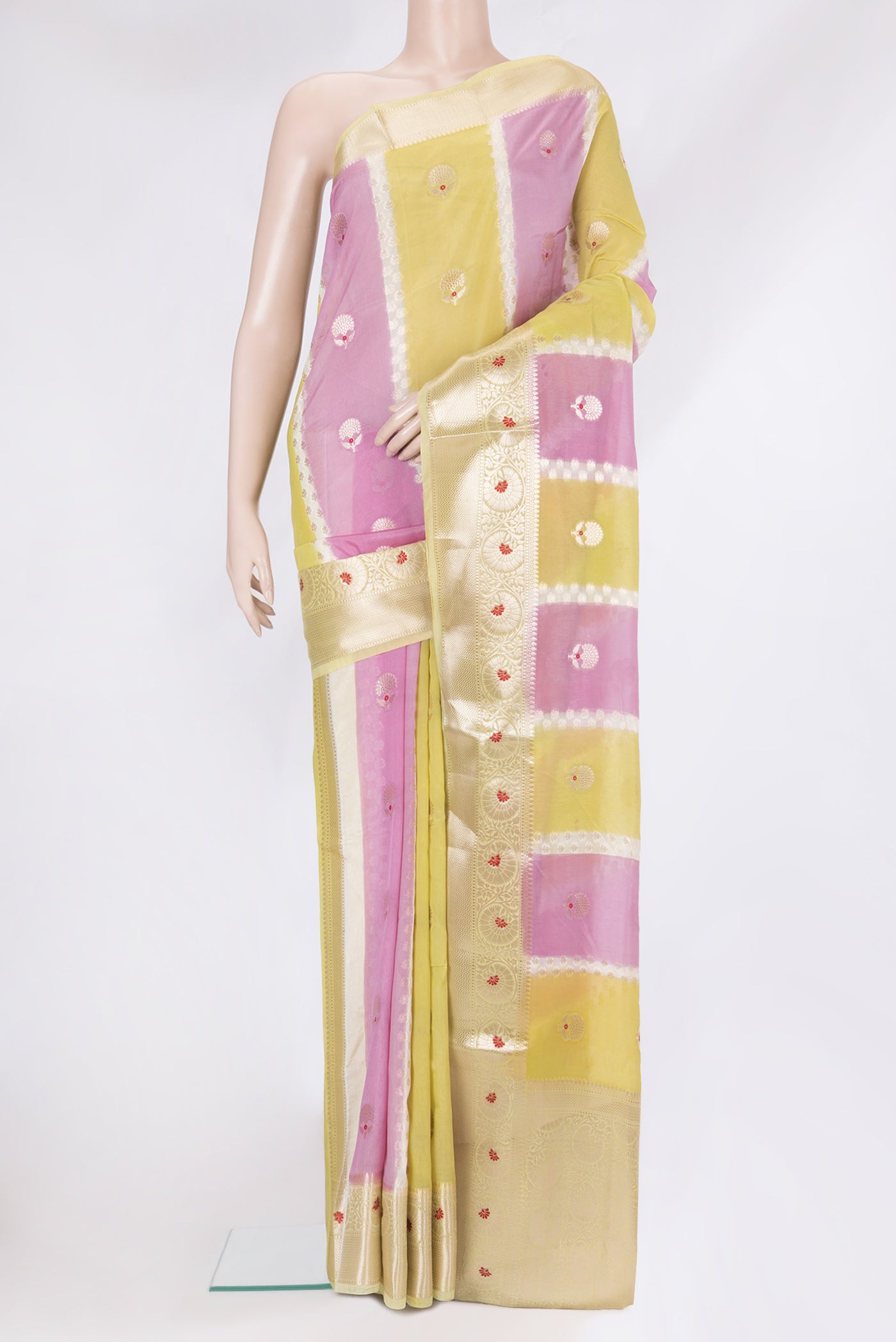 Multi Color Blended Tussar Silk Saree with Zari Butta on the body and Fancy Border.  displayed on a mannequin