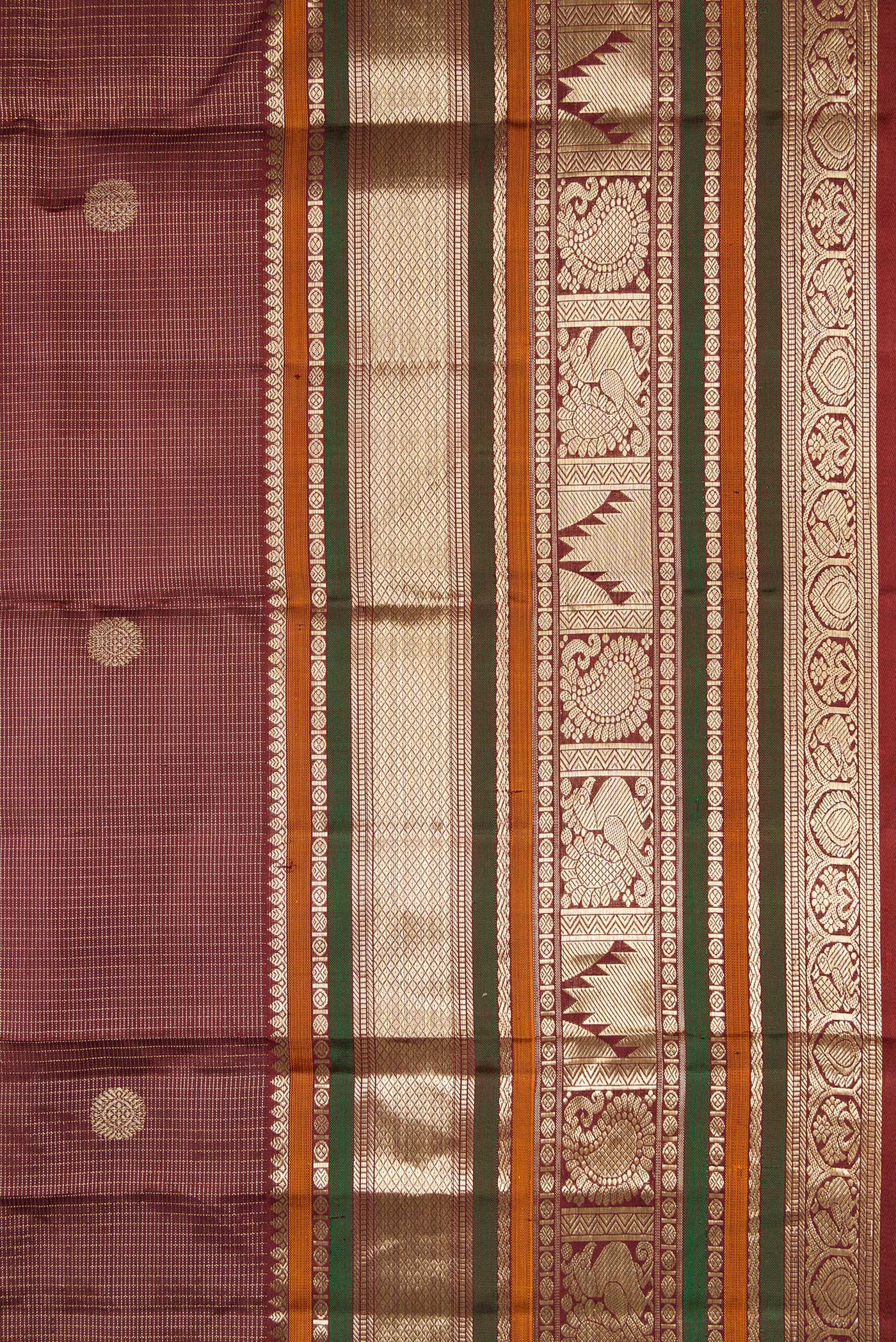 Border image of Pure Silk Pure Zari Maroon Dual Tone Kanchipuram Saree with Checked design on the body and Zari Border. 
