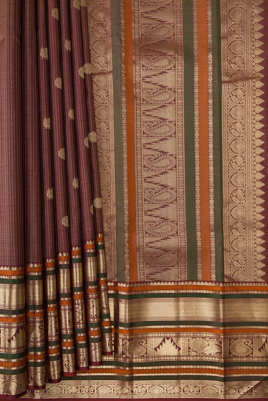 Pleats and pallu of Pure Silk Pure Zari Maroon Dual Tone Kanchipuram Saree with Checked design on the body and Zari Border. 
