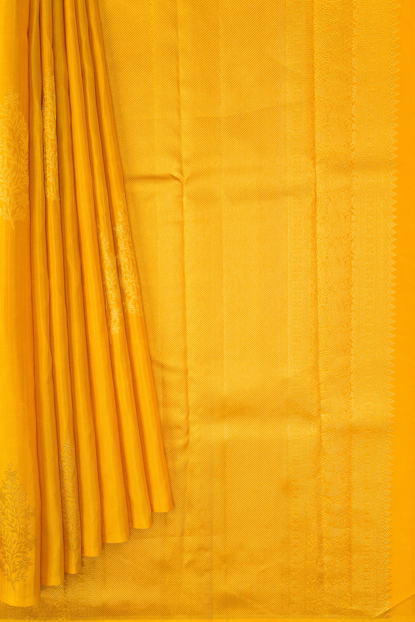 Pleats and pallu of Yellow Dual Tone Kanjivaram Silk Saree with Stripes on the body and Without Border. 