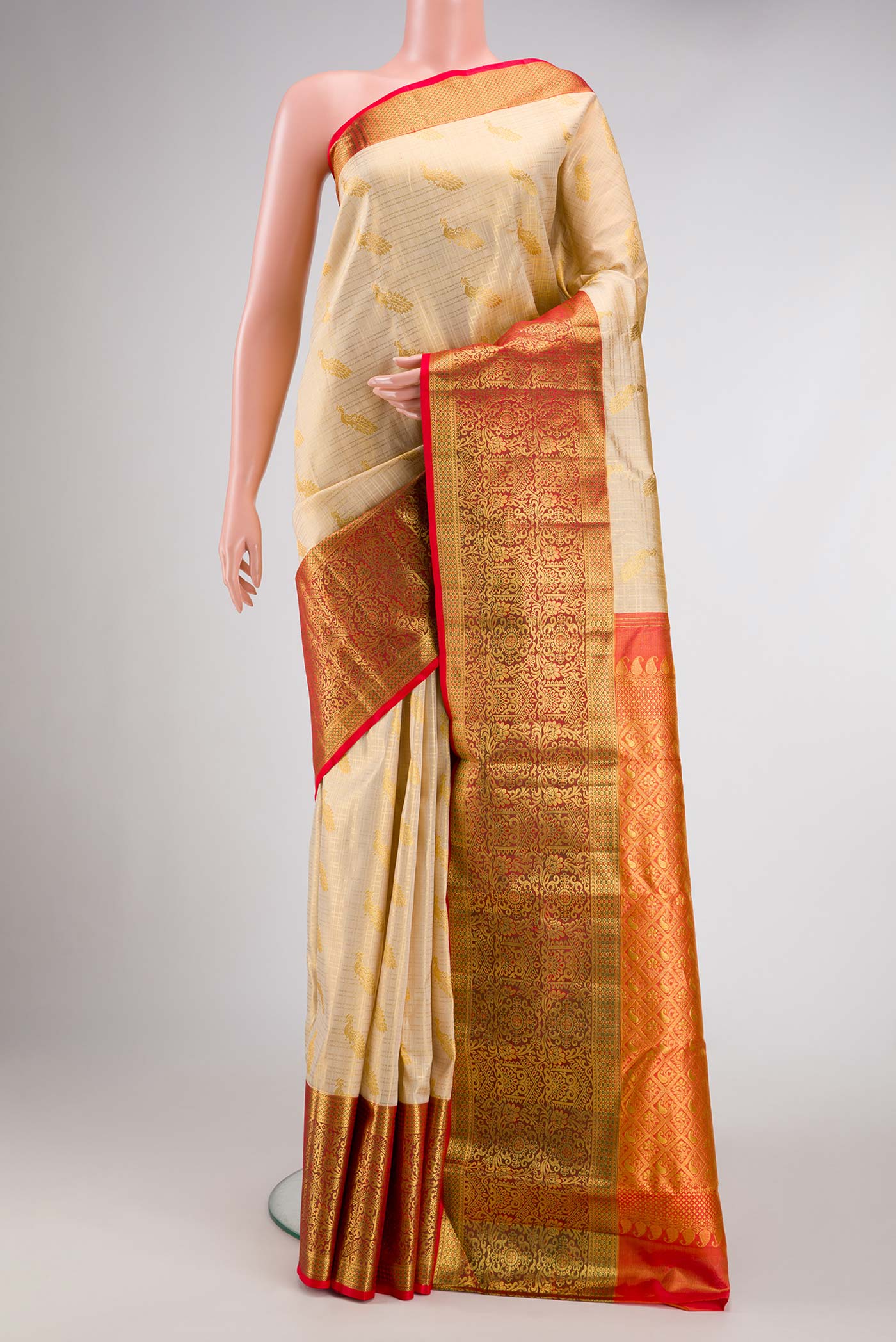 Sandal Dual Tone Kanjivaram Silk Saree with Zari Brocade on the body and Zari Border.  displayed on a mannequin