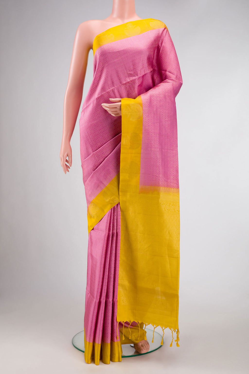 Pink Dual Tone Soft Silk Saree with Zari Brocade on the body and Zari Border.  displayed on a mannequin