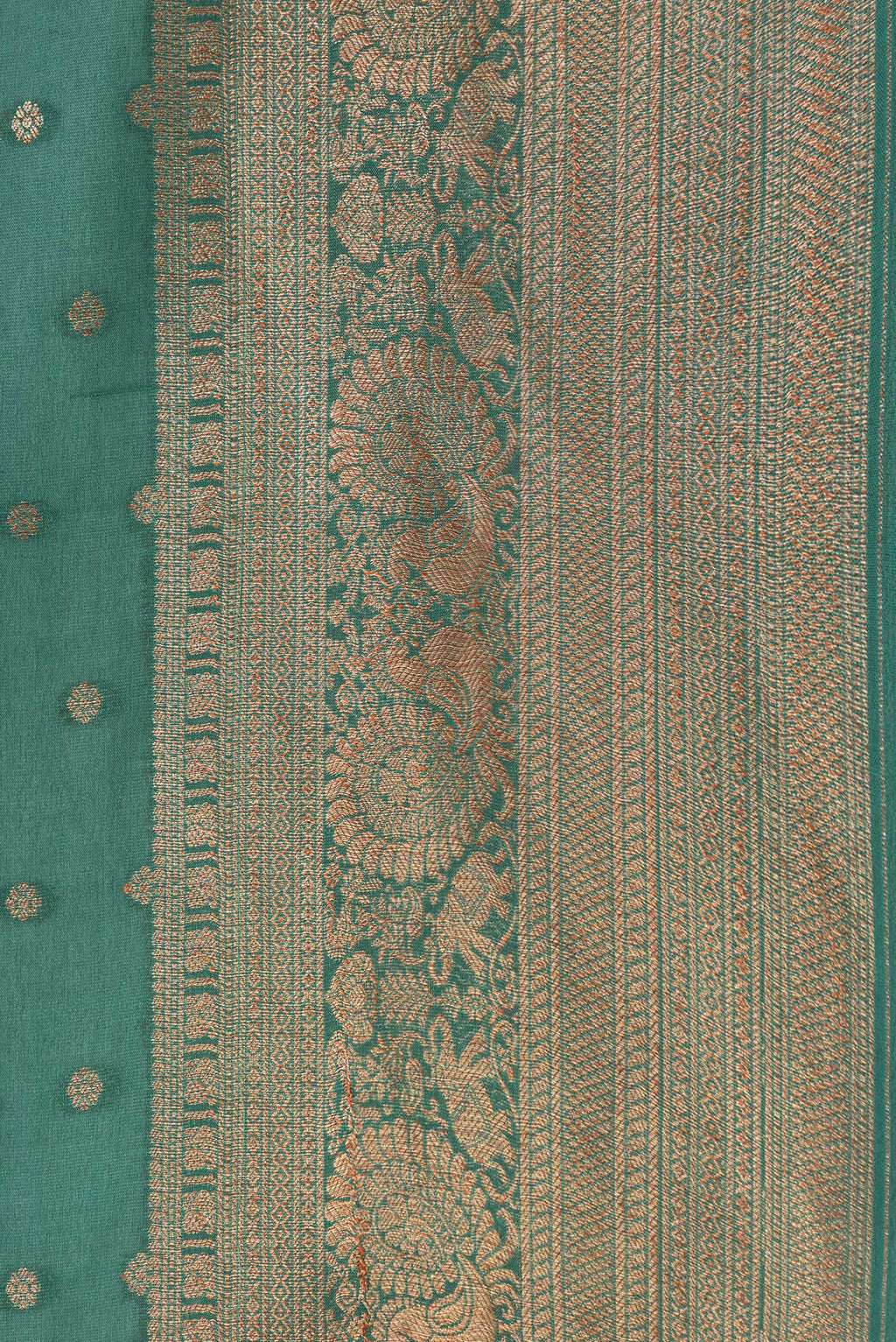 Border image of Bottle Green Dual Tone Banarasi Georgette Saree with Zari Butta on the body and Zari Border. 