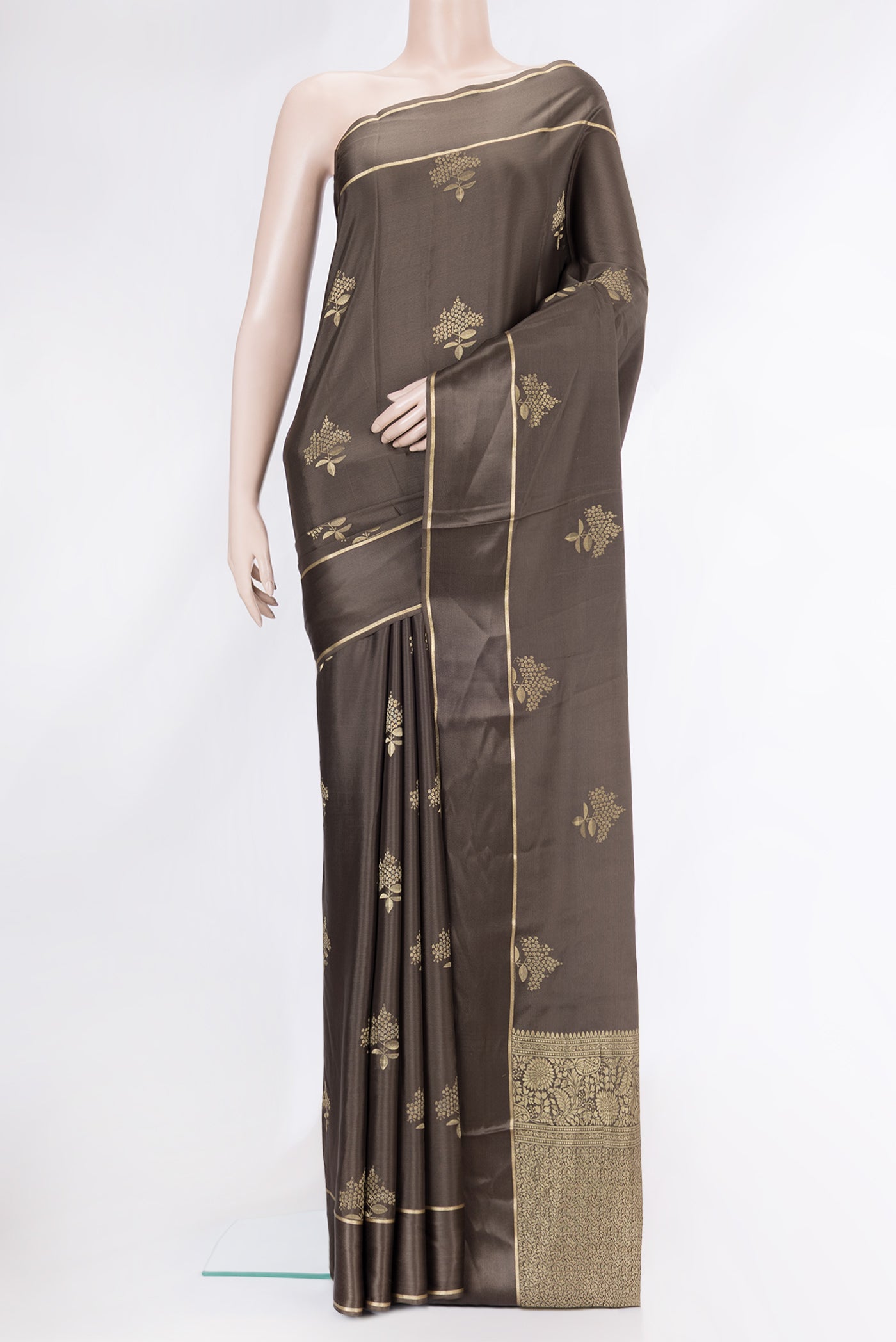 Brown Dual Tone Mysore Crepe Saree with Zari Butta on the body and Zari Border.  displayed on a mannequin