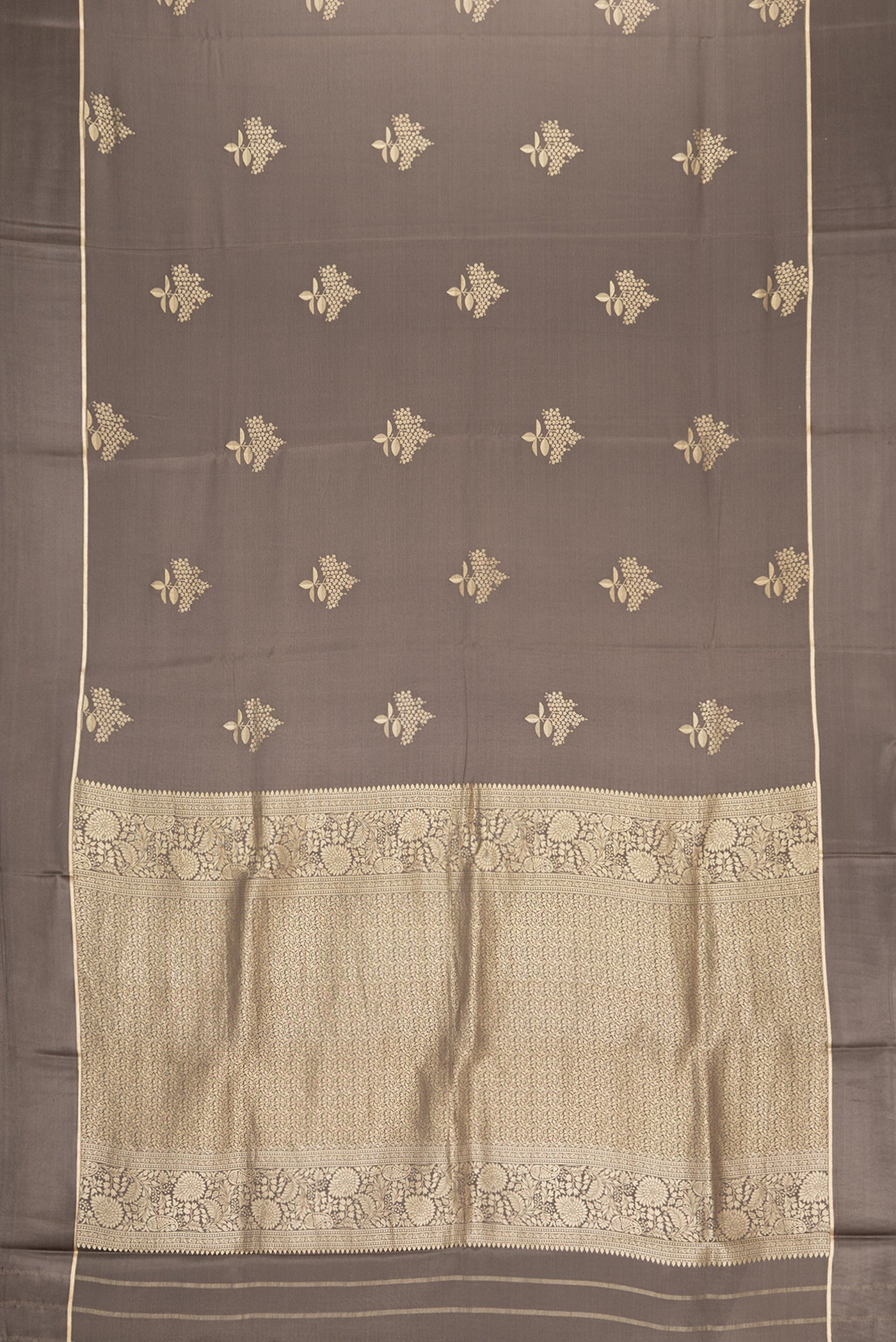 Flat view of Brown Dual Tone Mysore Crepe Saree with Zari Butta on the body and Zari Border. 