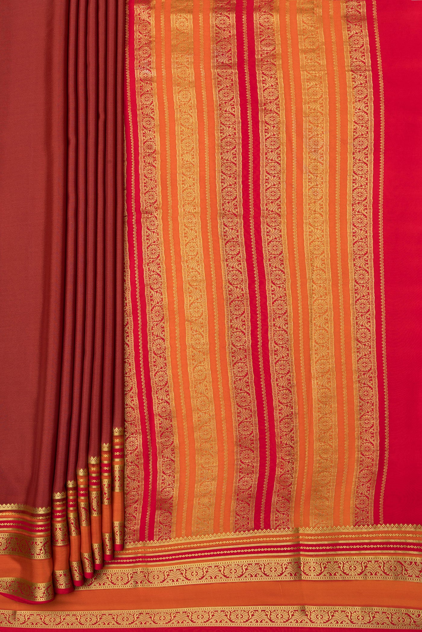 Pleats and pallu of Maroon Mysore Silk Saree with Plain Body and Zari Border. 