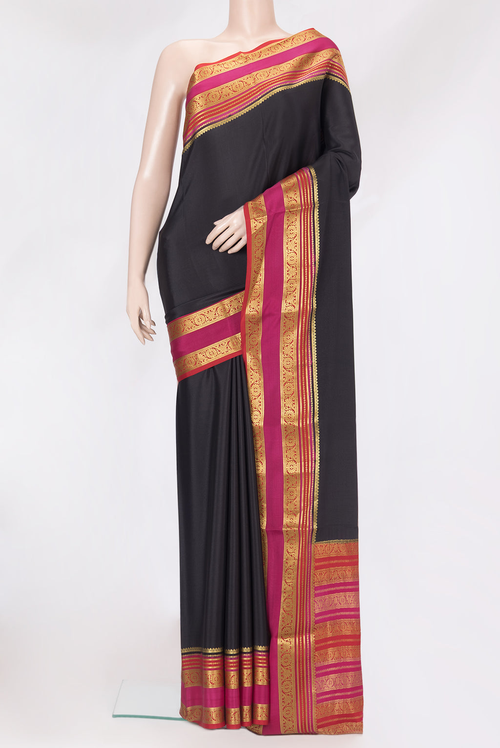 Black Mysore Silk Saree with Plain Body and Zari Border.  displayed on a mannequin