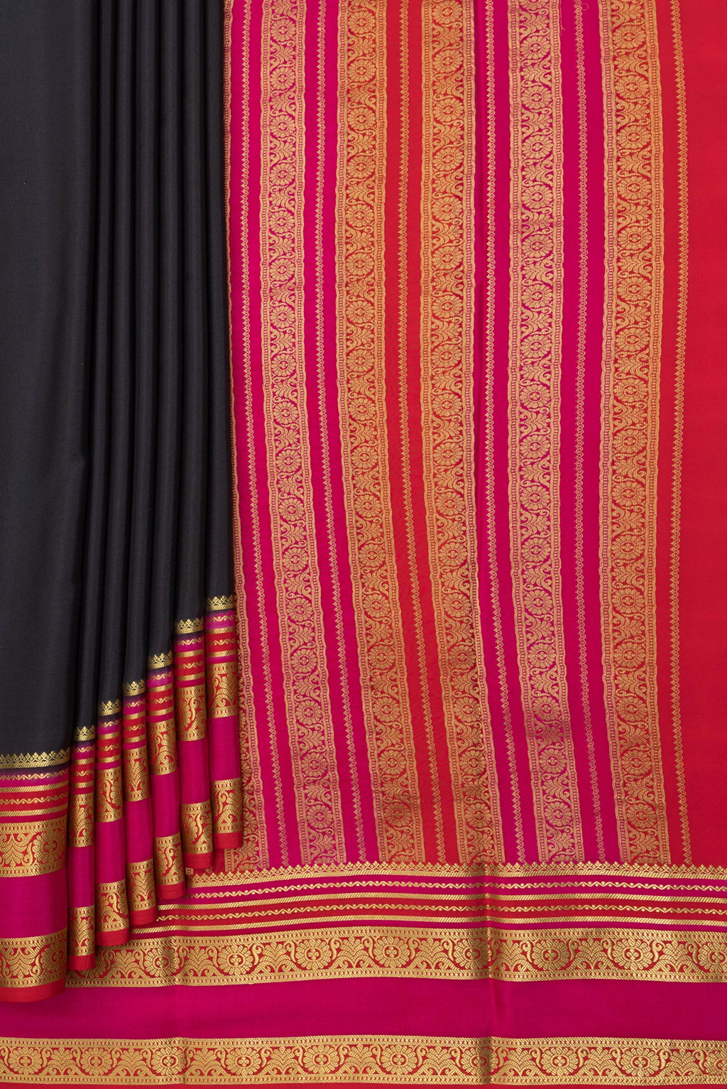 Pleats and pallu of Black Mysore Silk Saree with Plain Body and Zari Border. 