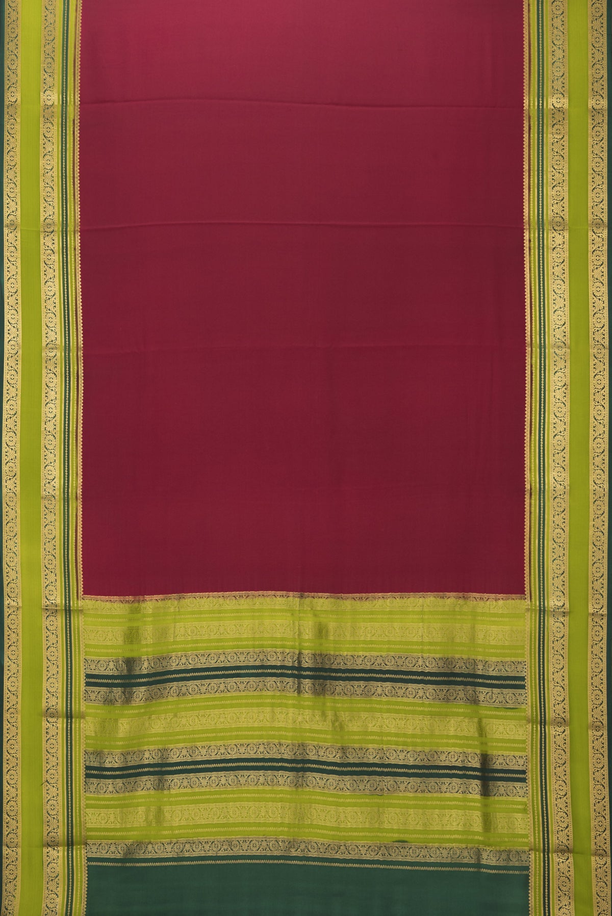 Flat view of Maroon Mysore Crepe Saree with Plain Body and Zari Border. 
