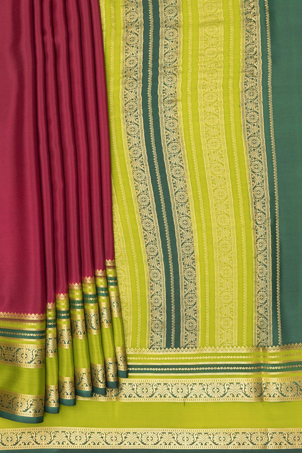 Pleats and pallu of Maroon Mysore Crepe Saree with Plain Body and Zari Border. 