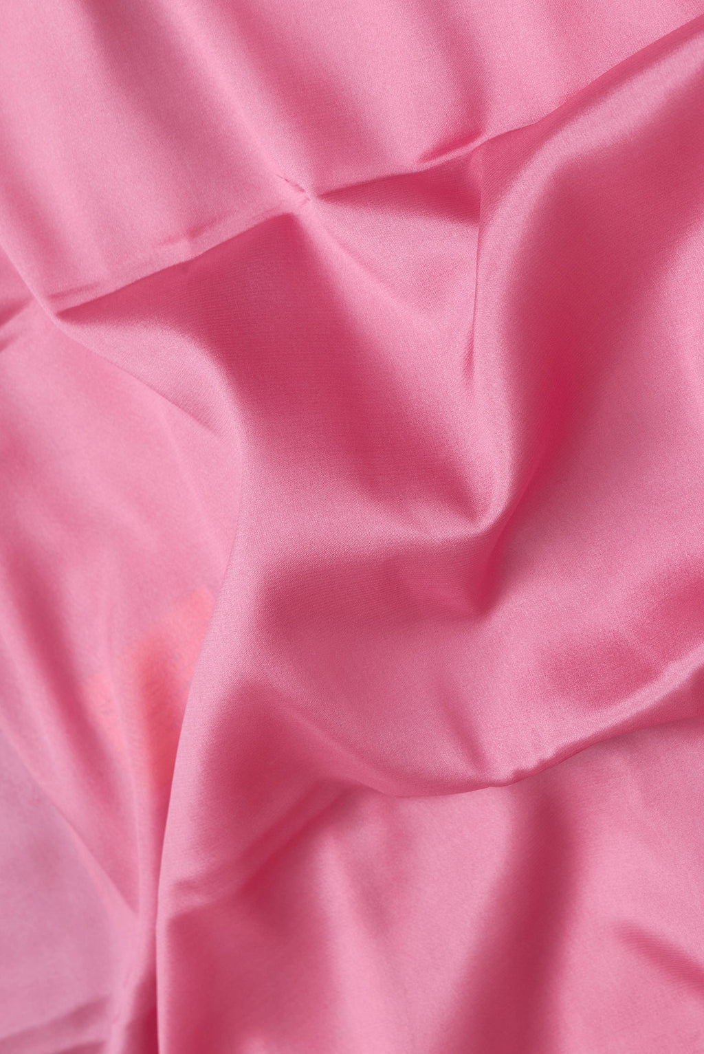 Close up of Pink Dual Tone Mysore Silk Saree with Zari Butta on the body and Zari Border.  displaying folds