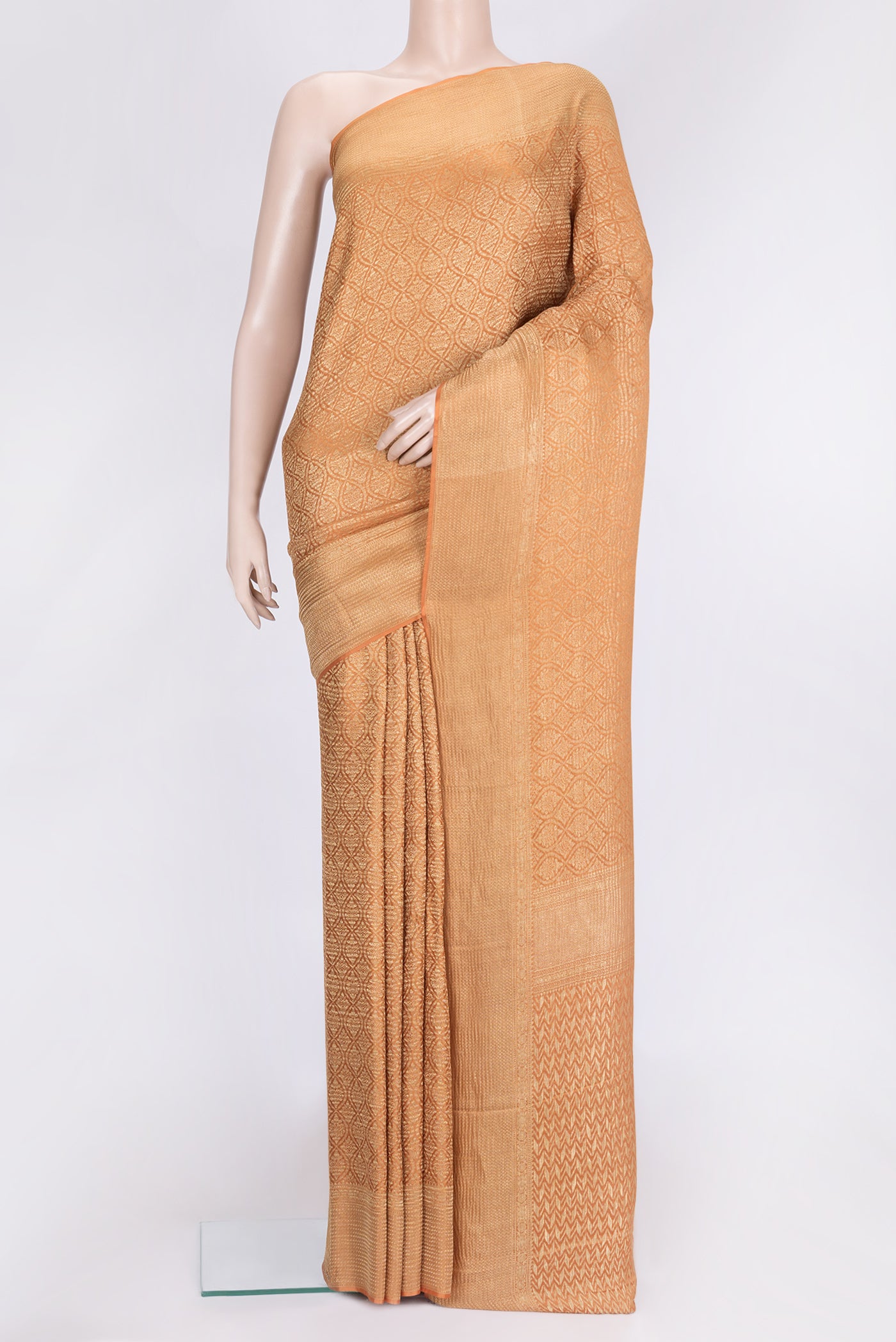 Orange Dual Tone Mysore Georgette Saree with Zari Brocade on the body and Zari Border.  displayed on a mannequin