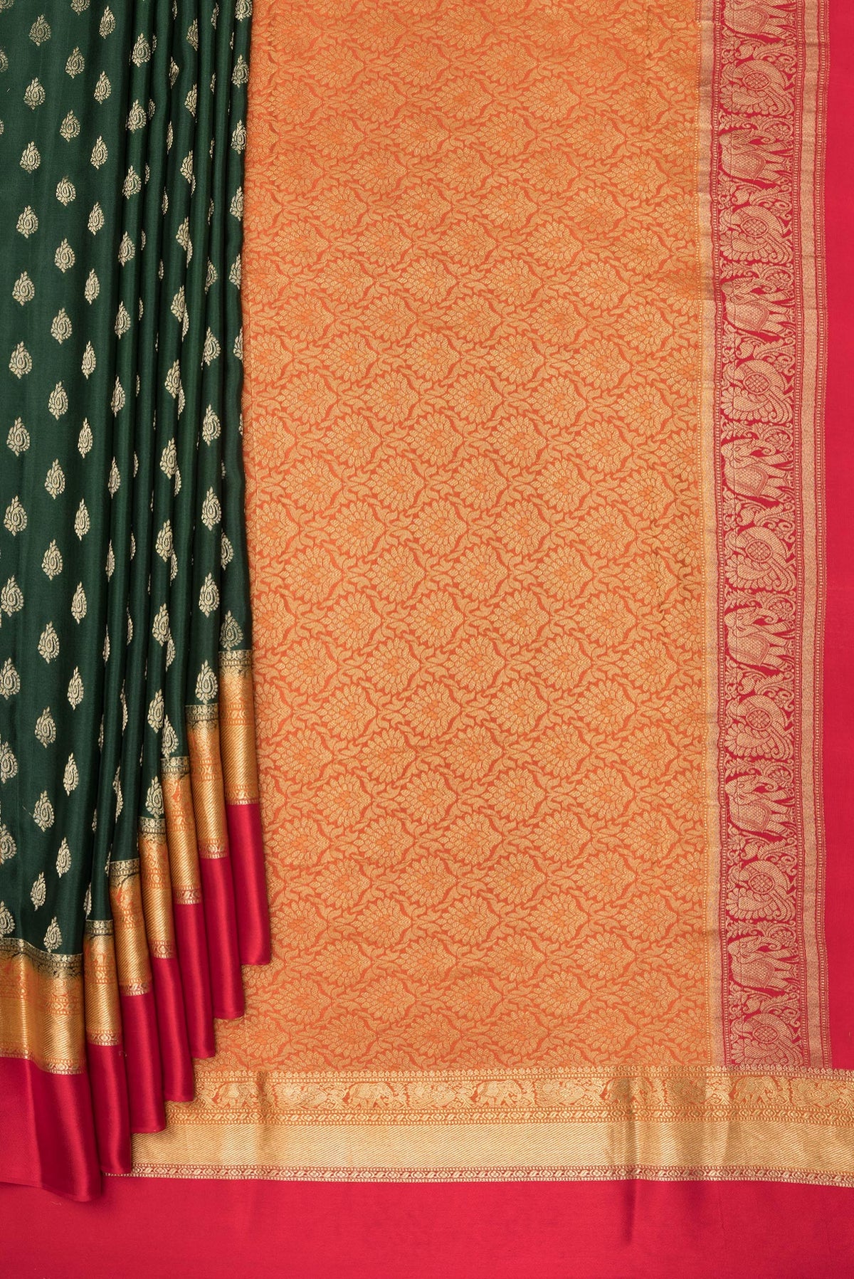 Pleats and pallu of Bottle Green Dual Tone Banarasi Georgette Saree with Zari Butta on the body and Zari Border. 