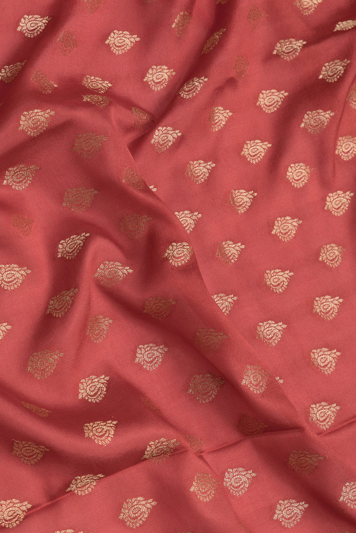 Close up of Dark Pink Dual Tone Mysore Crepe Saree with Zari Butta on the body and Zari Border.  displaying folds