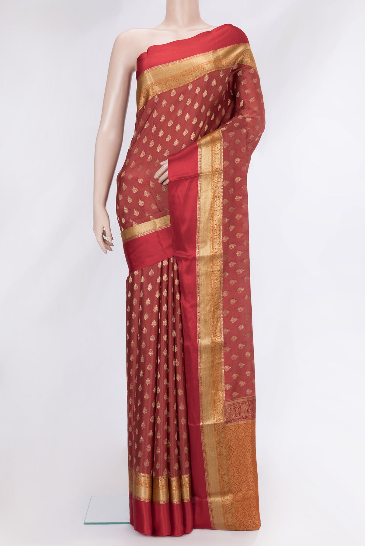 Dark Pink Dual Tone Mysore Crepe Saree with Zari Butta on the body and Zari Border.  displayed on a mannequin