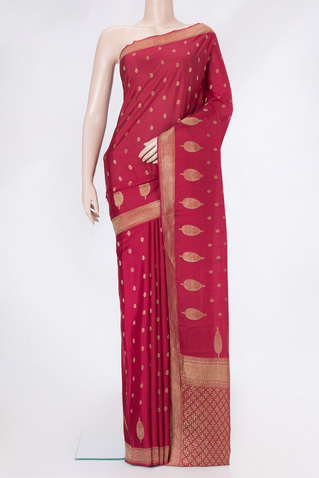 Red Mysore Crepe Saree with Zari And Thread Butta on the body and Zari Border.  displayed on a mannequin