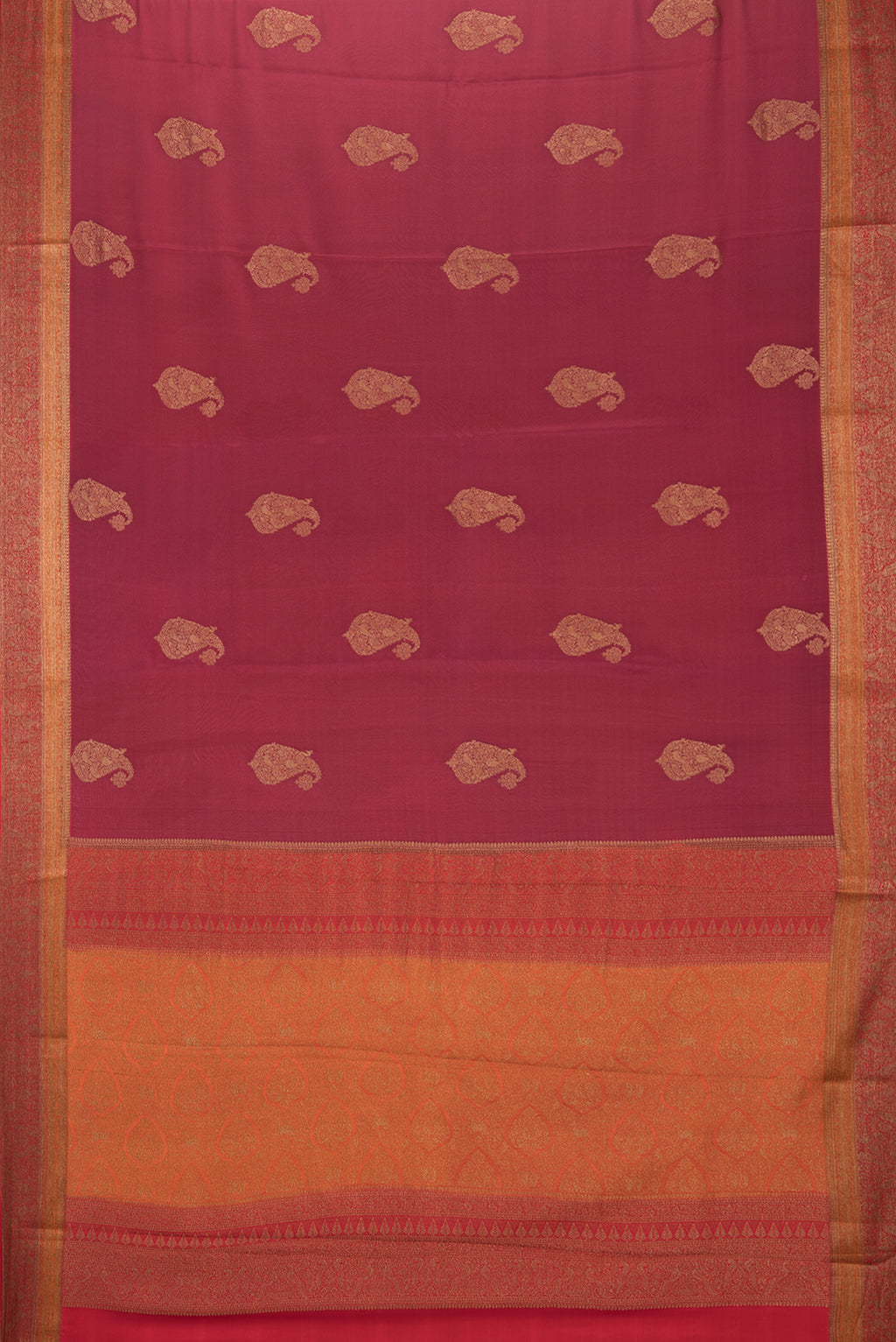 Flat view of Maroon Crepe Saree with Zari Butta on the body and Zari Border. 