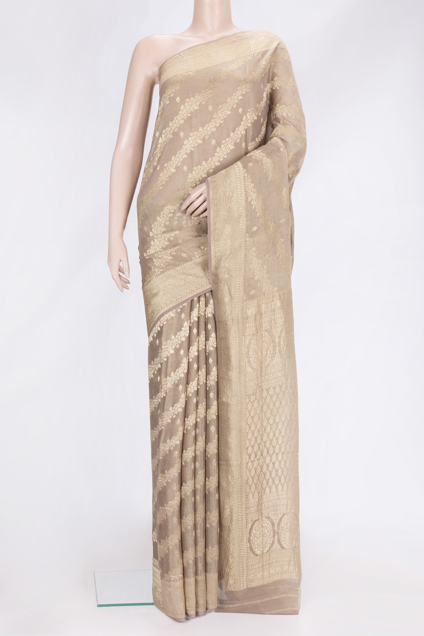 Brown Dual Tone Mysore Georgette Saree with Zari Brocade on the body and Zari Border.  displayed on a mannequin