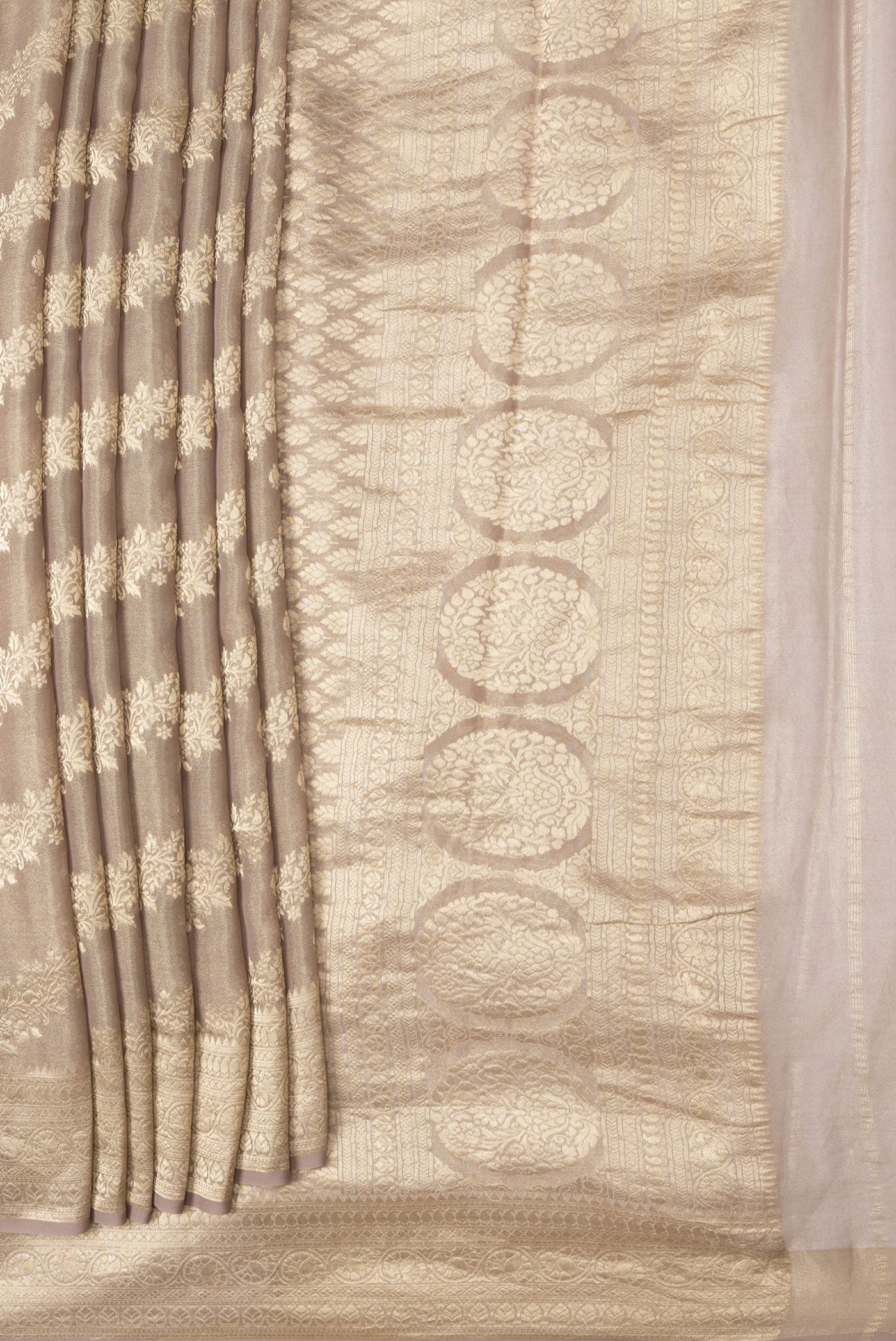 Pleats and pallu of Brown Dual Tone Mysore Georgette Saree with Zari Brocade on the body and Zari Border. 