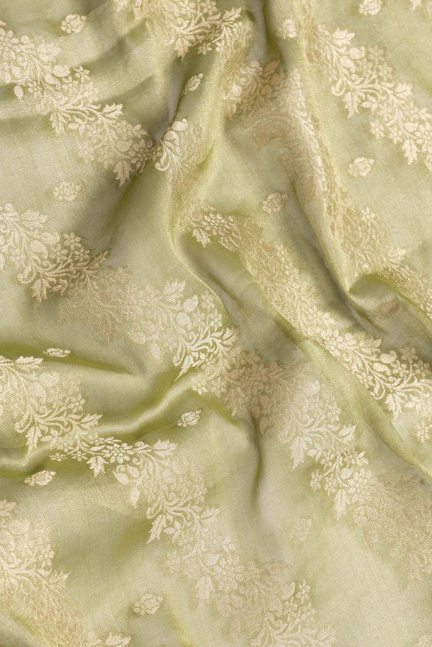 Close up of Mehandi Green Dual Tone Mysore Georgette Saree with Zari Brocade on the body and Zari Border.  displaying folds