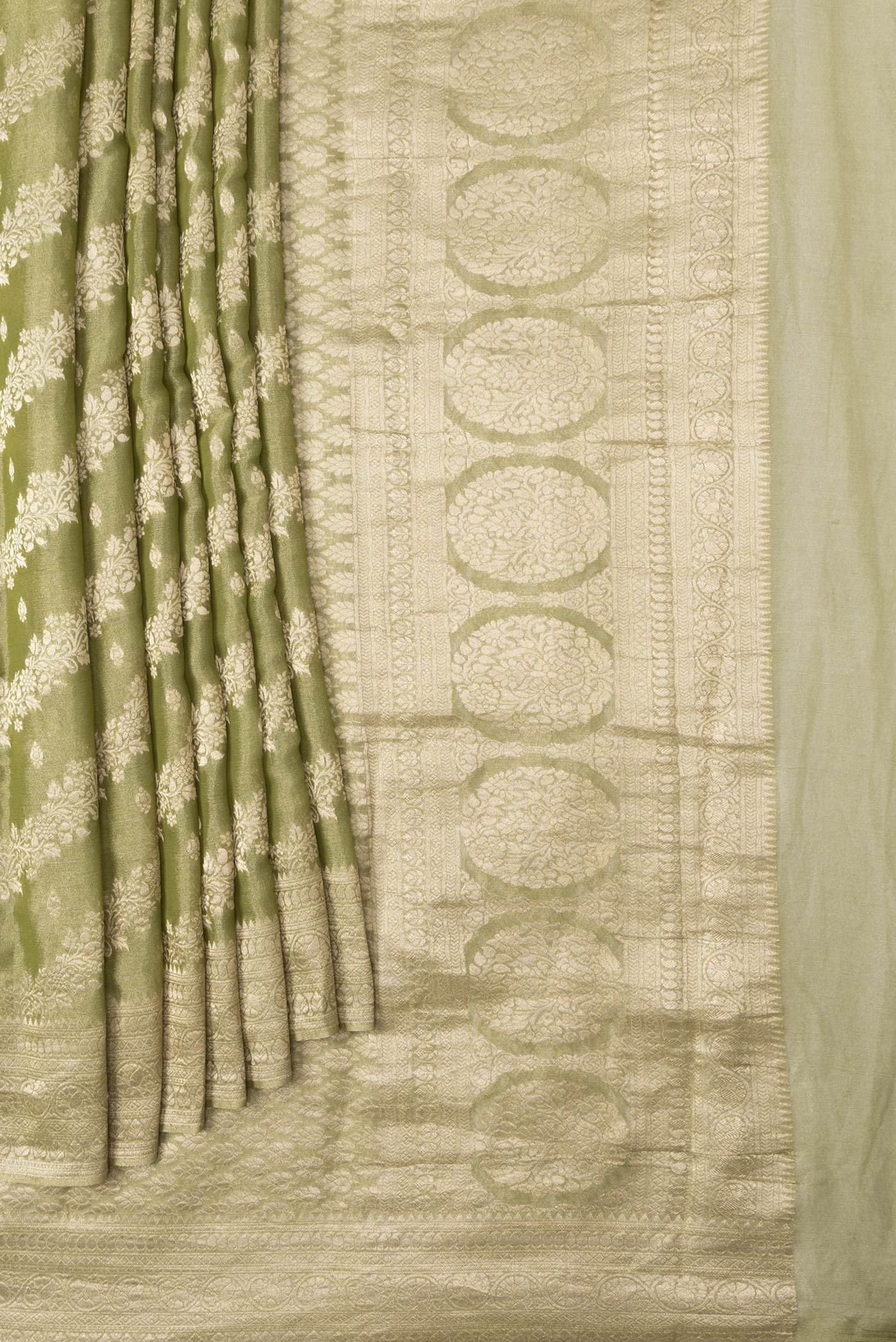 Pleats and pallu of Mehandi Green Dual Tone Mysore Georgette Saree with Zari Brocade on the body and Zari Border. 