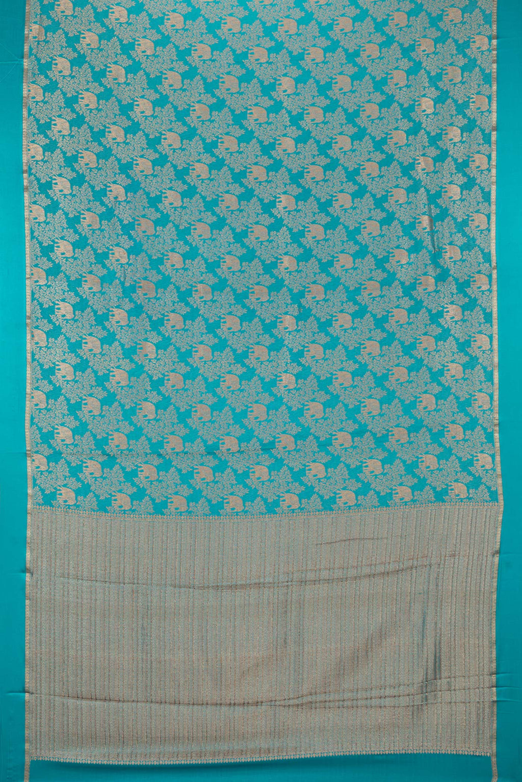 Flat view of Teal Mysore Crepe Saree with Zari Brocade on the body and Zari And Thread Border. 
