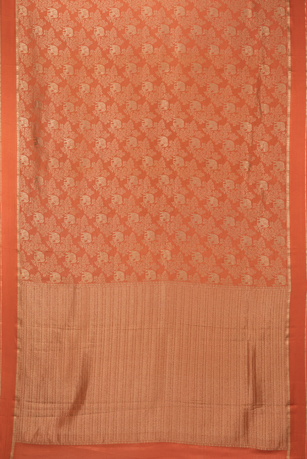 Flat view of Rust Georgette Saree with Zari Brocade on the body and Zari Border. 