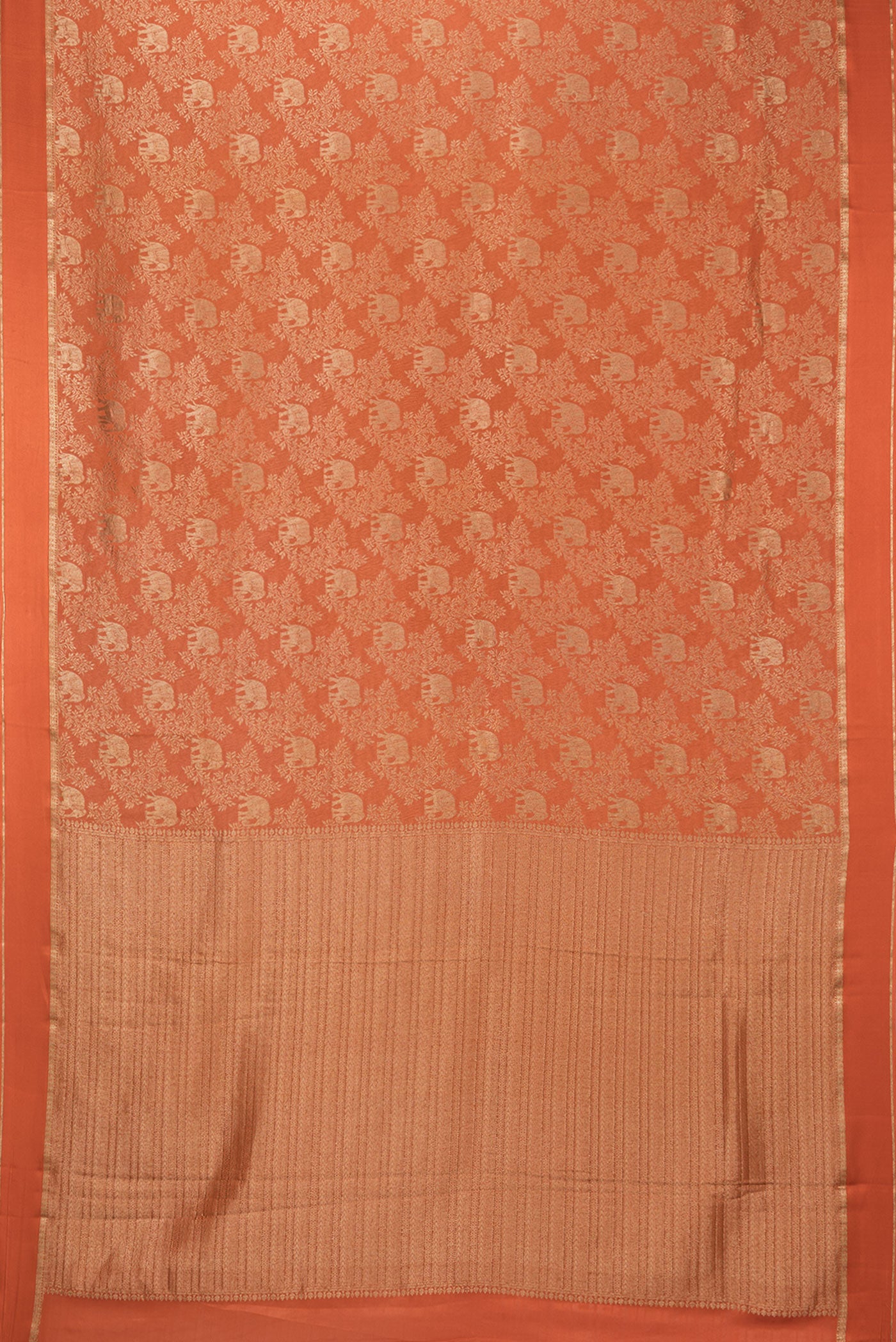 Flat view of Rust Georgette Saree with Zari Brocade on the body and Zari Border. 