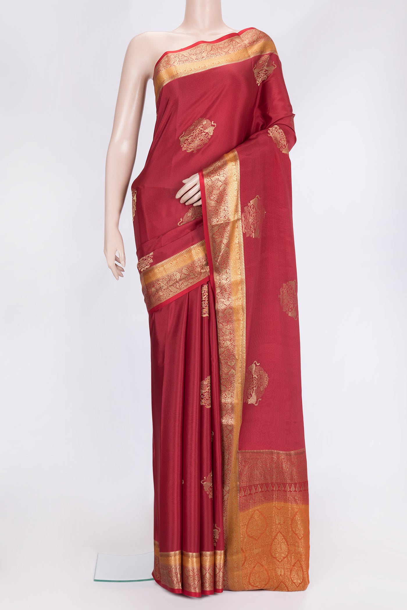 Maroon Dual Tone Mysore Georgette Saree with Zari Butta on the body and Zari Border.  displayed on a mannequin