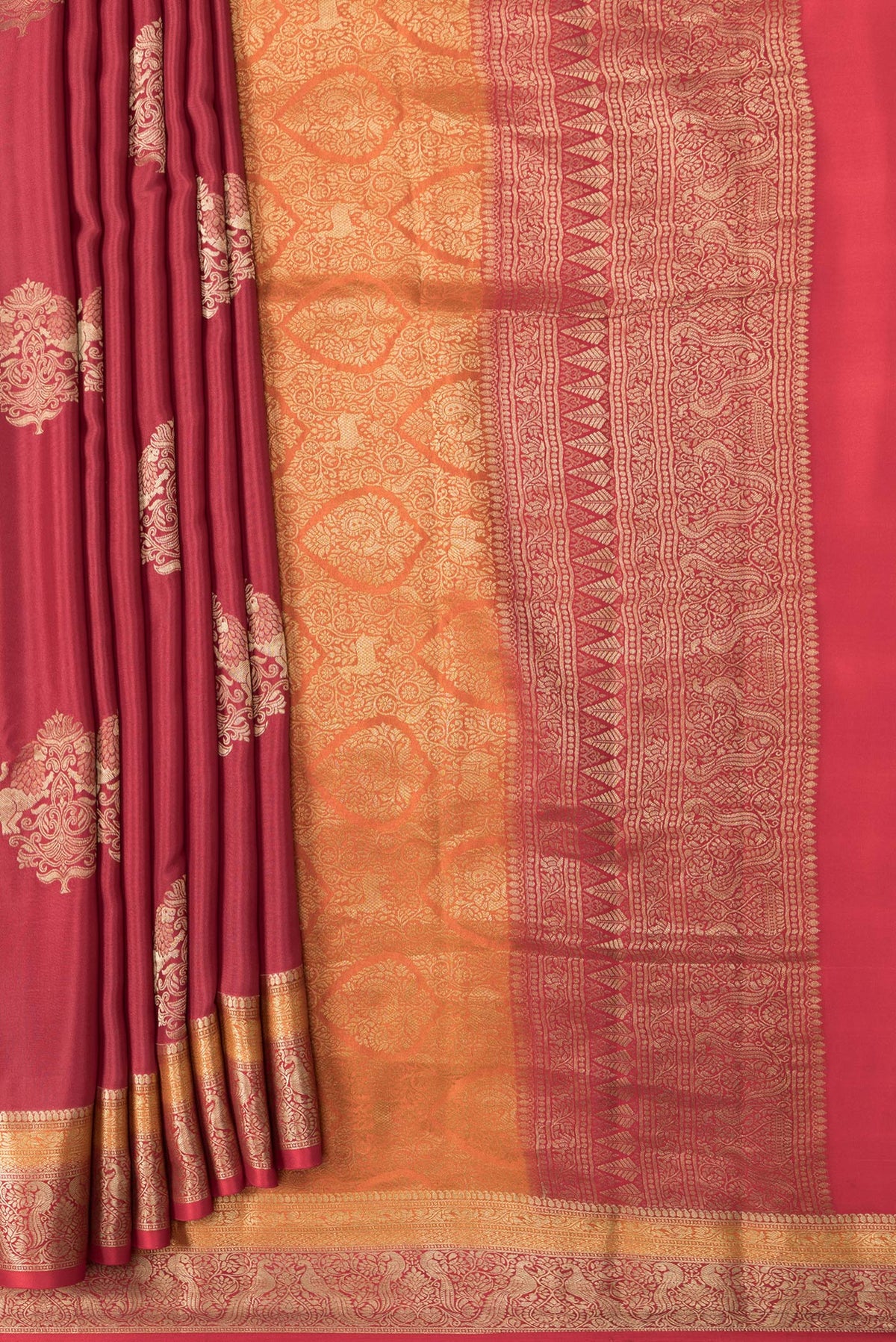 Pleats and pallu of Maroon Dual Tone Mysore Georgette Saree with Zari Butta on the body and Zari Border. 