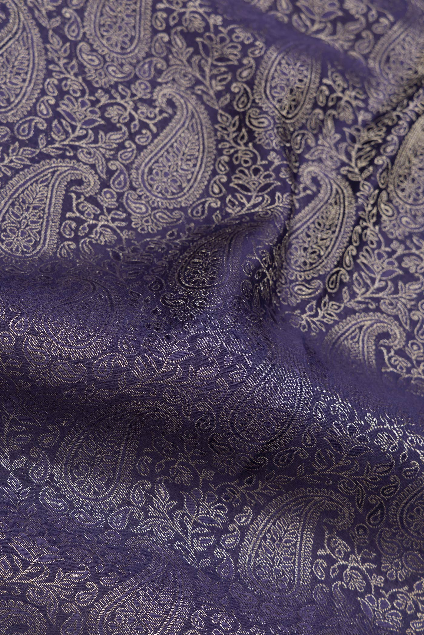 Close up of Navy Blue Dual Tone Mysore Silk Saree with Zari Brocade on the body and Zari Border.  displaying folds