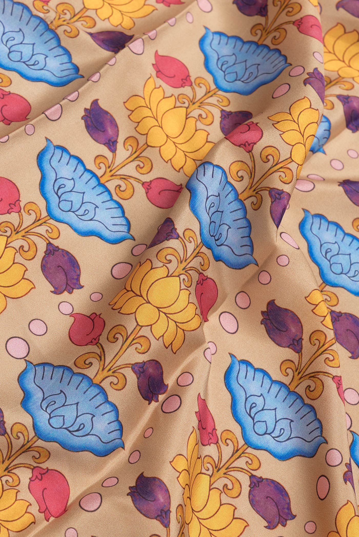 Close up of Beige Dual Tone Mysore Silk Saree with Printed design on the body and Zari Border.  displaying folds